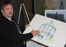 John Grace, the deputy reeve of Goderich, explains the gazebo designed for the town's downtown park during a public meeting recently.