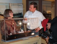 Huron County Museum curator Patricia Hamilton shows artifacts recovered from The Great Storm 1913 to Global News Toronto reporter Mark McAllister and cameraman Ben Jonah.