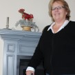 The mantle is nearly bare as Kathy Young prepares for the arrival of decorators.