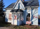 A sign was posted in front of the home during Windstock, the one-year celebration after the tornado. The Brindley family has been homeless for more than 16 months now.