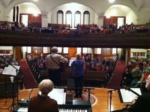 The audience was invited to sing along in an evening of mostly folk music.