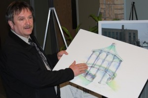 John Grace, the deputy reeve of Goderich, explains the gazebo designed for the town's downtown park during a public meeting recently.